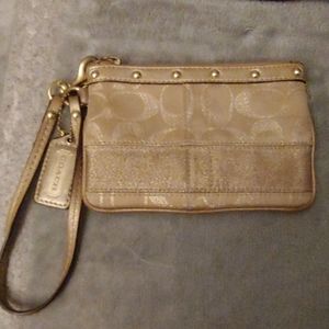 🌟 Coach gold glittery wristlet